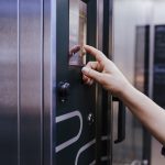 hands-of-baker-woman-using-oven-machine-in-bakery-2023-11-27-05-12-43-utc