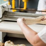 woman-baker-working-with-dough-at-the-bakery-2024-09-15-17-24-46-utc